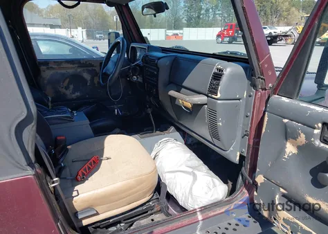 2002 Jeep Wrangler Sport z USA, uszkodzony, nr VIN 1J4FA49S72P710102